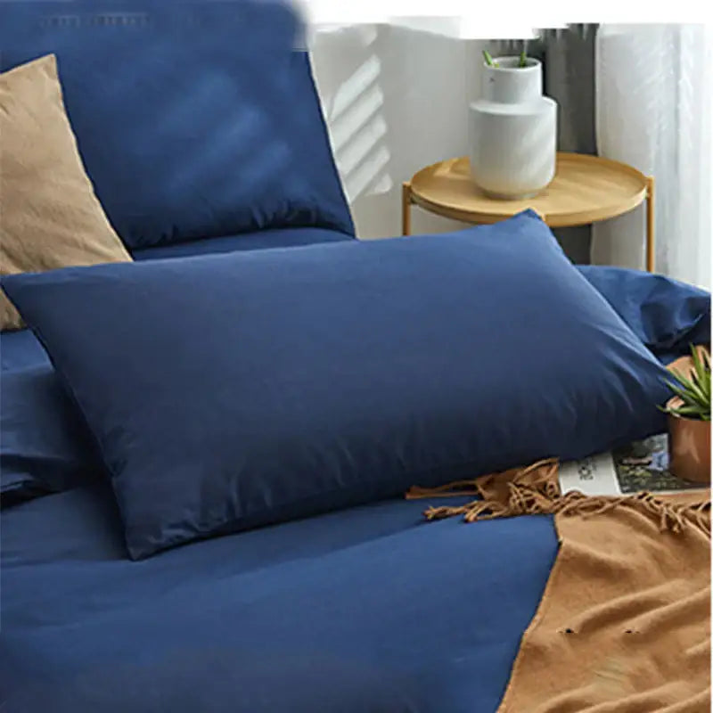 Deep navy blue solid color pillowcase in a decorbites cotton 4pcs bedding set with smooth glossy fabric finish