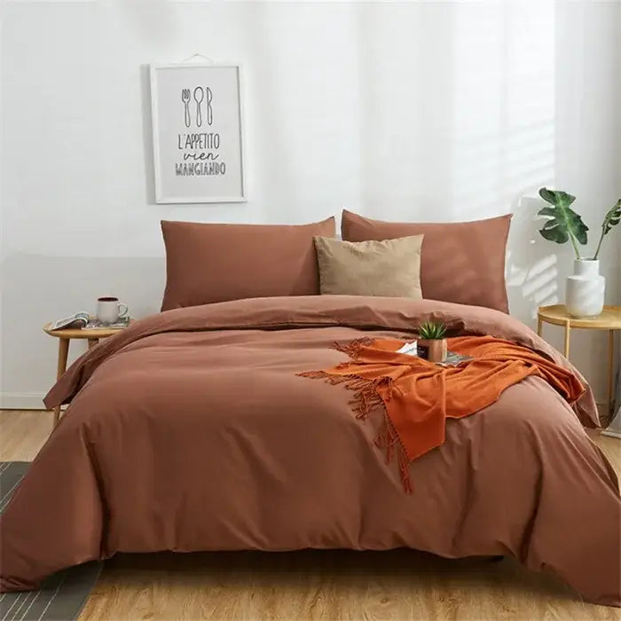 Warm terracotta bedspread with soft textured fabric and frayed edges in navy blue solid color decorbites cotton 4pcs bedding set