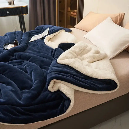Deep navy double layer queen blanket with soft white sherpa lining featuring plush and cozy texture