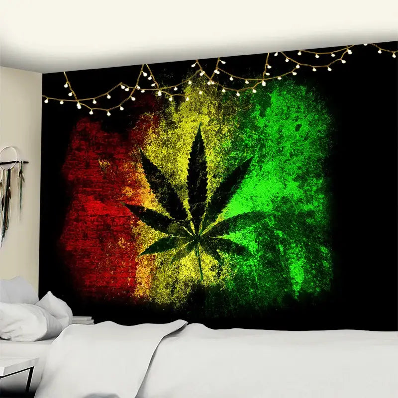 Rasta-themed wall tapestry with black cannabis leaf silhouette on red yellow and green background for bedroom decor