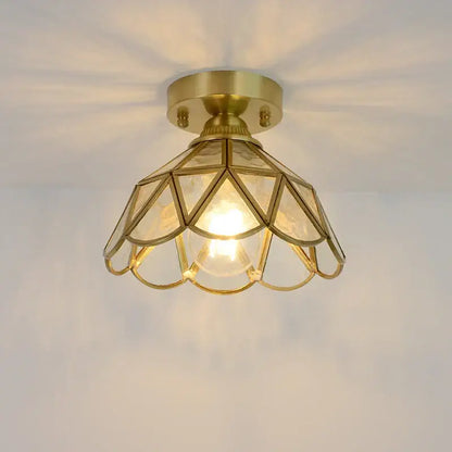 Brass-finished ceiling light with geometric petal-shaped amber and teal stained glass copper led shade for bedroom