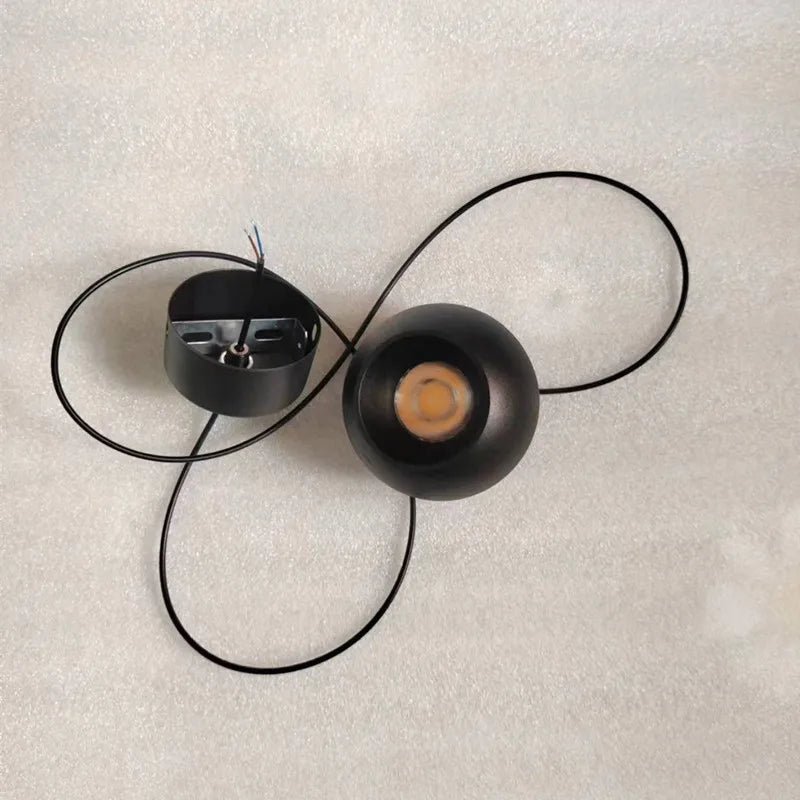 Nordic Ball Pendant Light in Black or White Aluminum - Decorbites