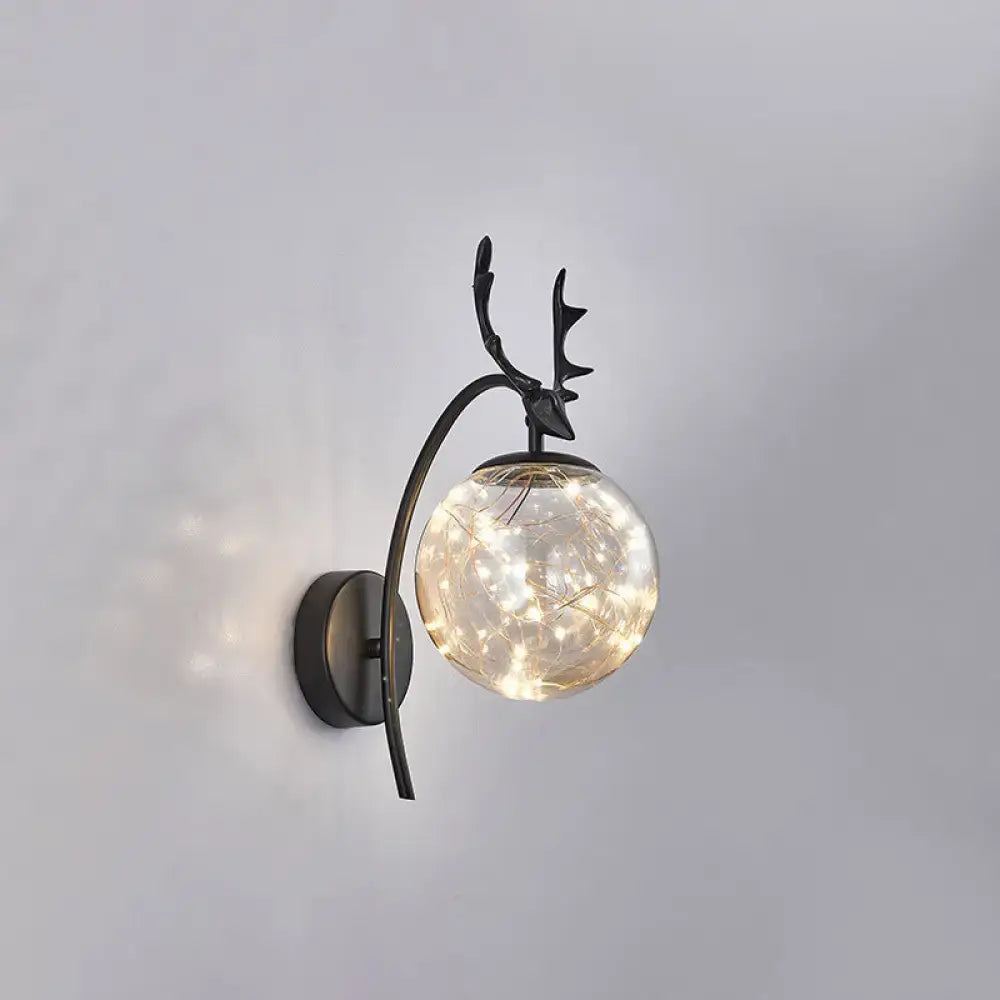 Black metal nordic ball wall mount deer-head sconce with spherical glass globe and warm led fairy lights for bedroom