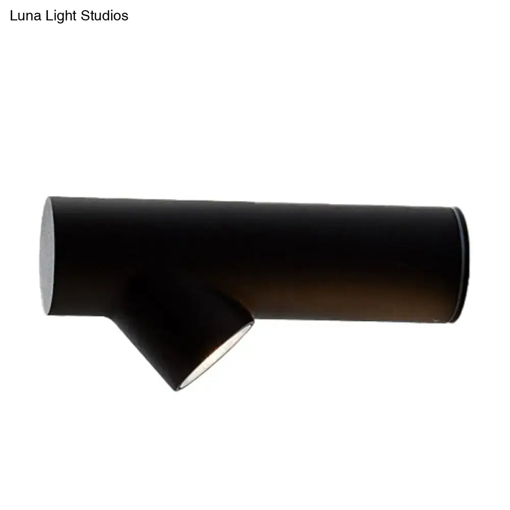 Nordic black adjustable led wall lamp with cylindrical fixture type and modern matte finish for bedroom spotlight use