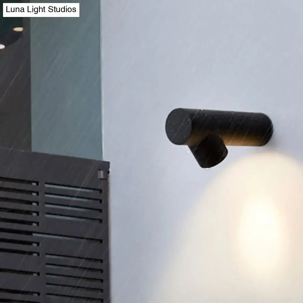 Nordic black adjustable led wall lamp with dual-directional cylindrical spotlight fixture for bedroom lighting