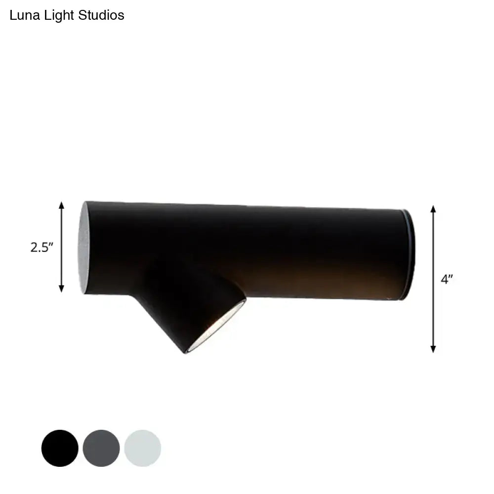 Nordic black adjustable led wall lamp feature matte cylindrical fixture with sleek modern design and angled head spotlight