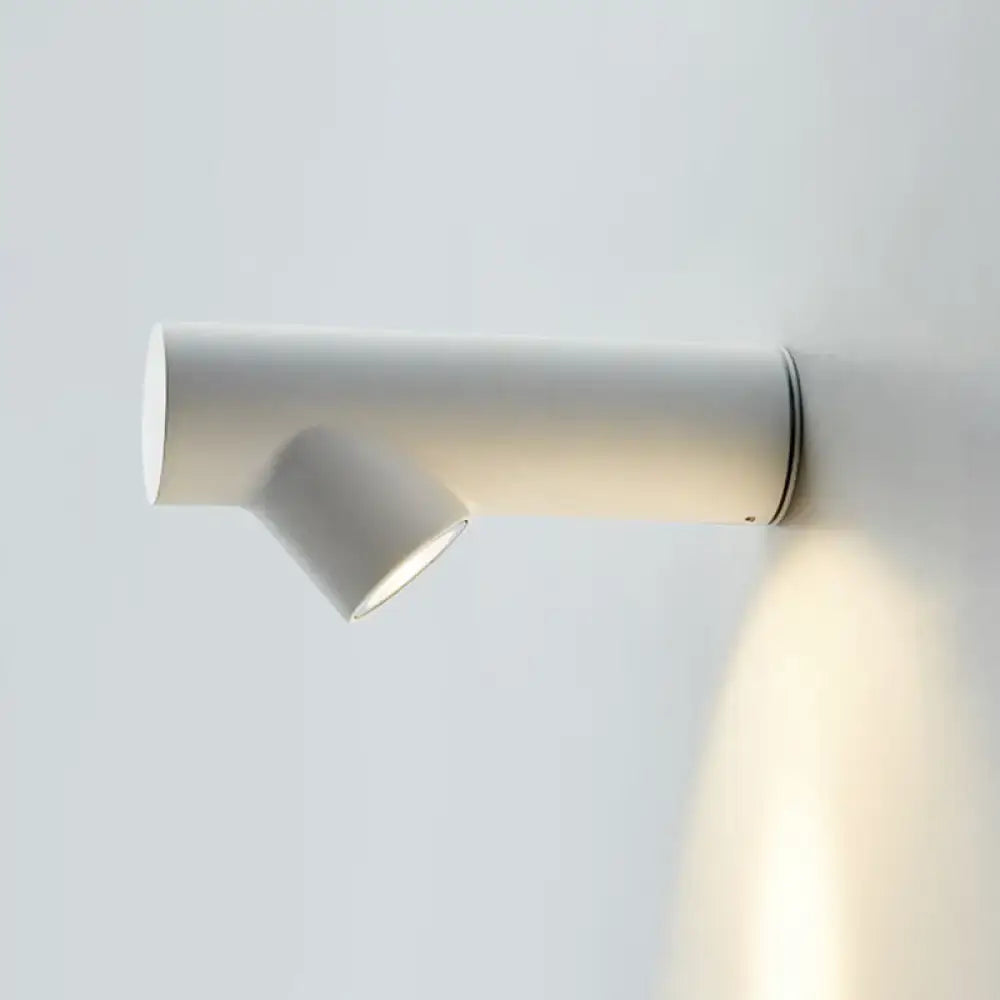 Minimalist white cylindrical wall-mounted spotlight featuring adjustable led light type and sleek fixture height design for bedrooms