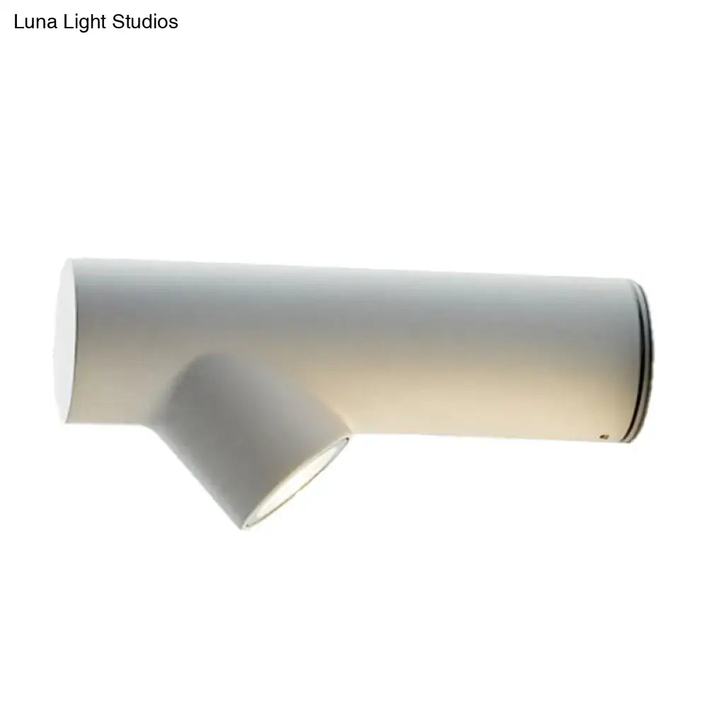 Nordic black adjustable led wall lamp with white cylindrical fixture and black accent ring for bedroom spotlight lighting