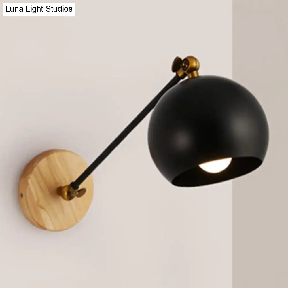 Nordic black and brass spherical wall light with matte finish, wooden base, and e26 e27 bulb socket for bedroom use