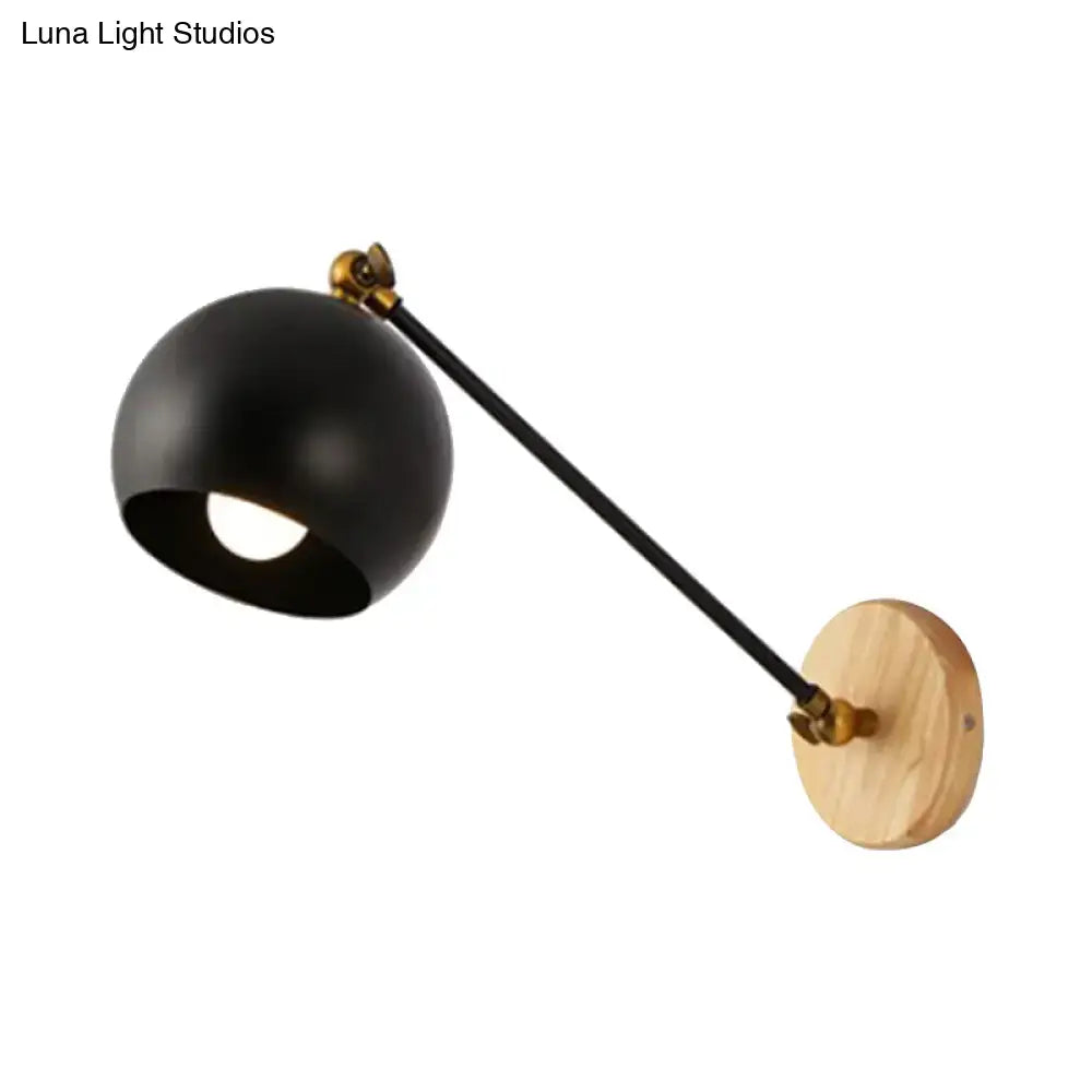 Nordic black and brass spherical wall light with black matte finish, bulb socket for e26 e27, mounted on light wood base