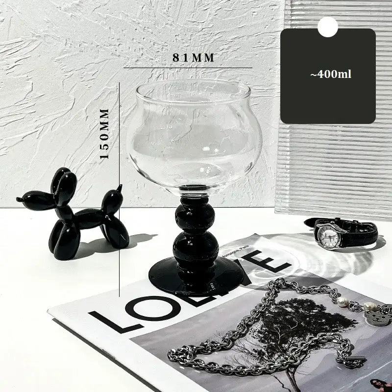 Clear glass goblet with black bulbous glass beaded stem and base from nordic black decorbites glass beaded collection