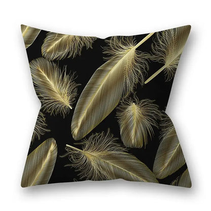 Black throw pillow with golden leaves pillow pattern featuring golden feathers for living room decor