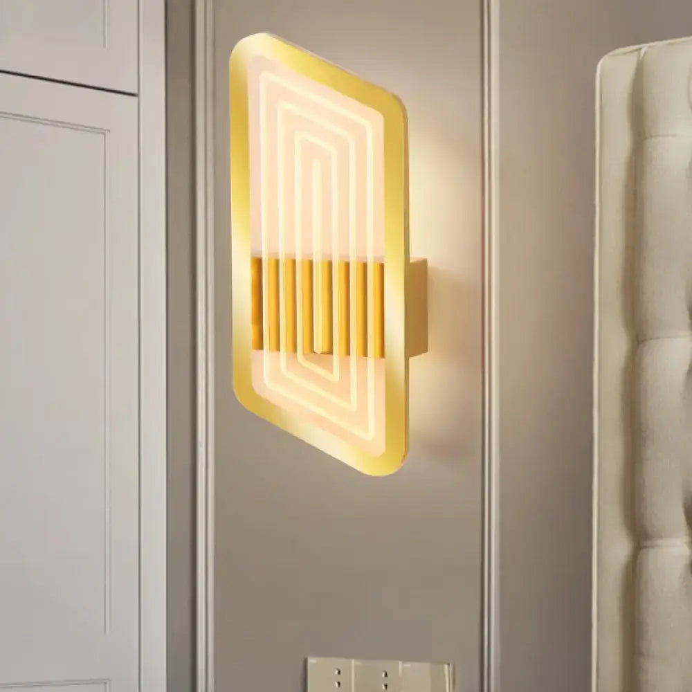 Modern gold-toned Nordic black and gold metallic wall light fixture with sleek rectangular design and neon concentric lines