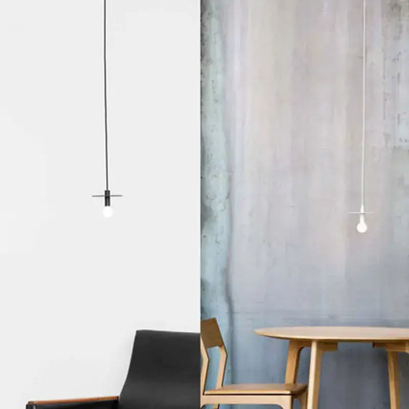 Nordic black iron pendant light with slender cords and white bulb fixtures ideal for dining room decorbites iron pendant