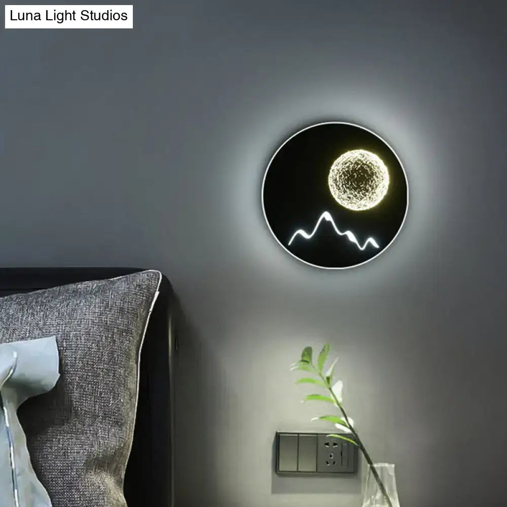 Circular black white grey mountain wall light with glowing golden moon and white mountain silhouette fixture height suitable for bedroom