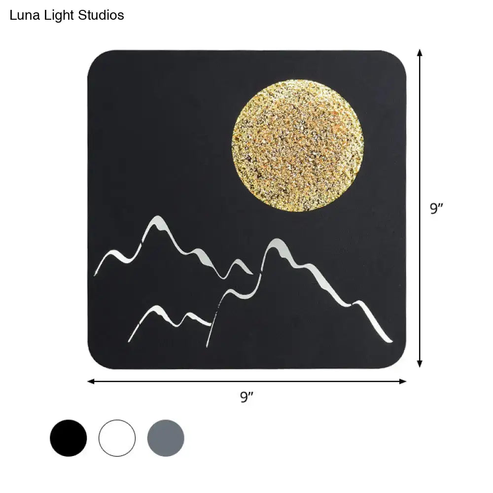 Black white grey nordic wall light with textured gold moon and white mountain silhouettes fixture height design