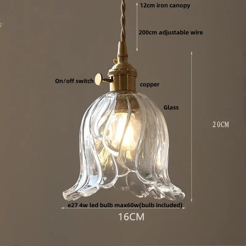 Nordic brass and clear glass led pendant light with fluted petal design for dining rooms by decorbites clear glass