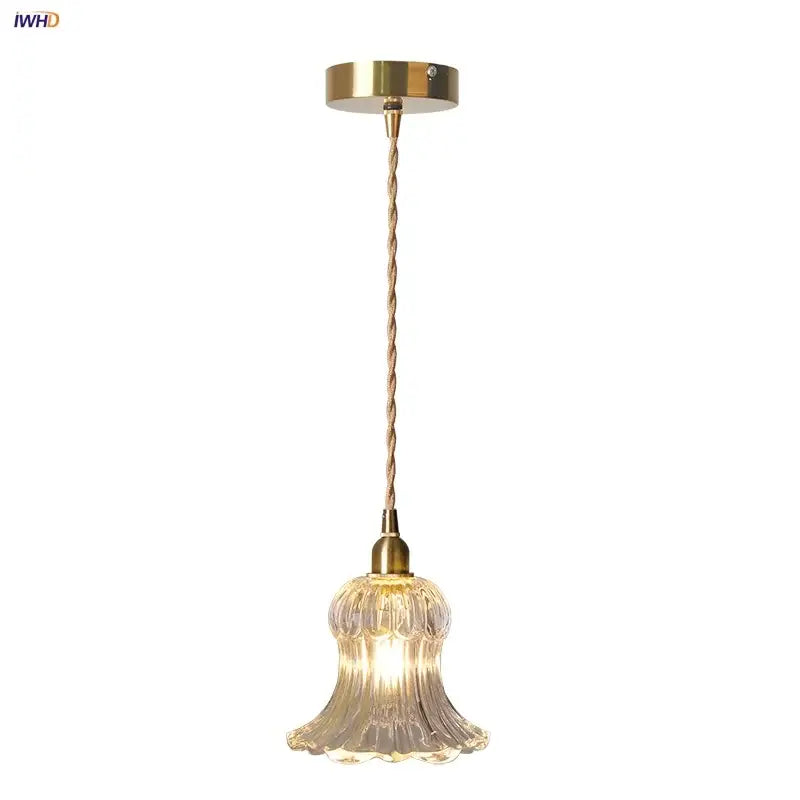Nordic brass and ribbed glass pendant light fixture with delicate bell-shaped shade and twisted cord for kitchen lighting