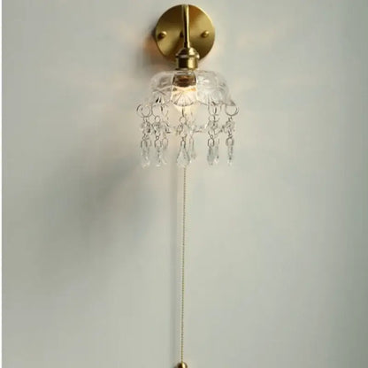Nordic brass wall light with decorbites crystal glass led shade and dangling crystal droplets for bedroom decor