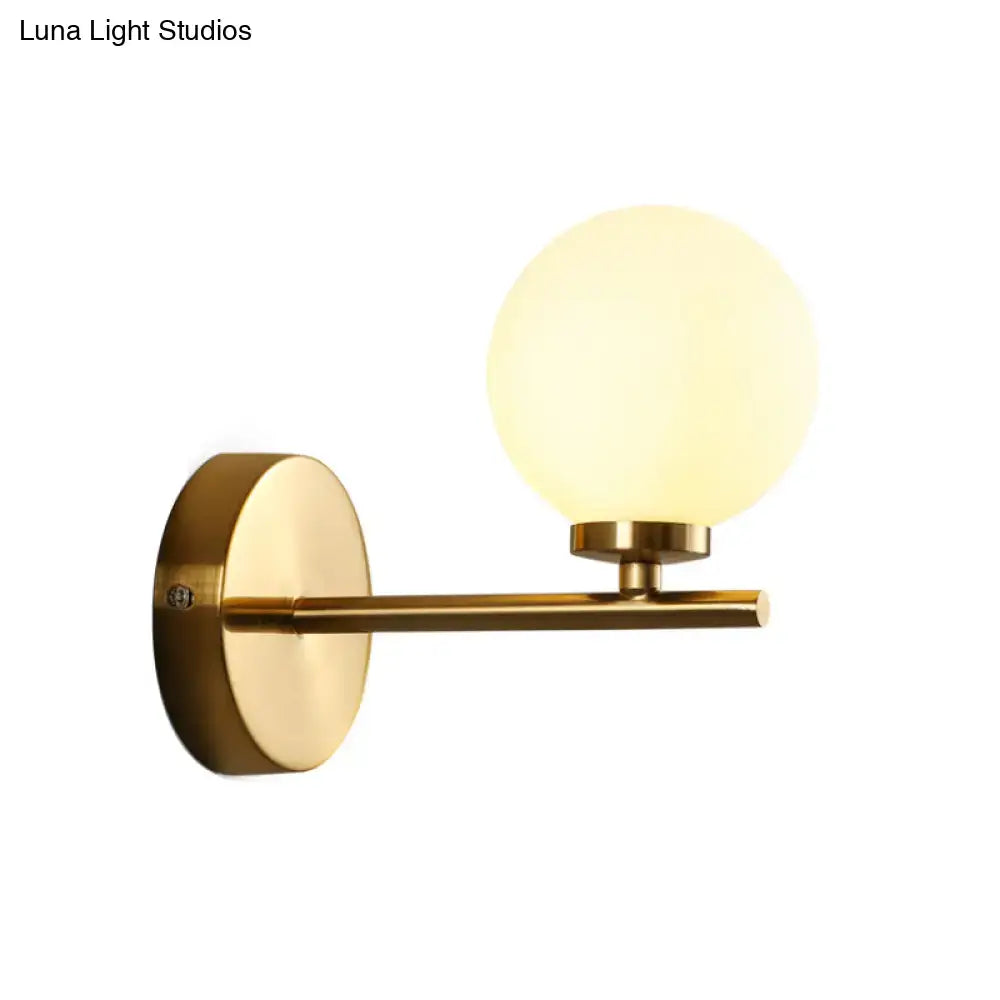 Gold-toned nordic brass wall sconce light with frosted glass globe suitable for 110v-120v 220v-240v bedroom lighting