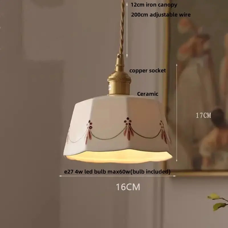 Cream-colored ceramic pendant light with brown floral embroidery and brass copper socket for brown wood led decorbites