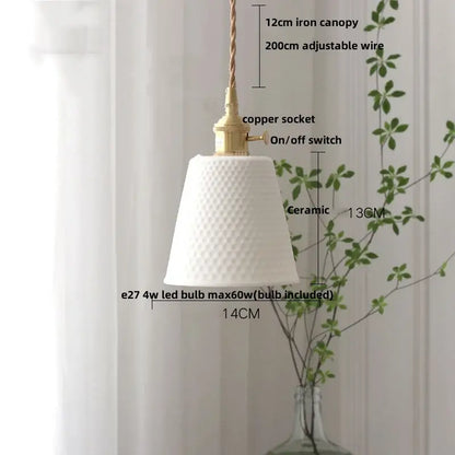 White ceramic pendant light with textured diamond pattern and brass finish paired with decorbites brown wood led design