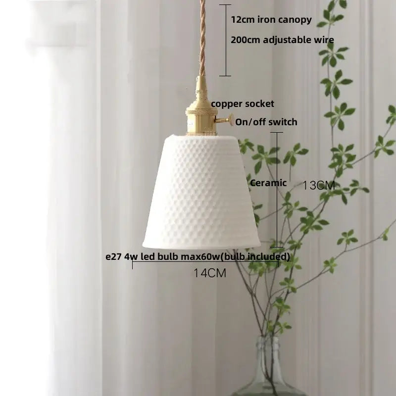 White ceramic pendant light with textured diamond pattern and brass finish paired with decorbites brown wood led design