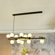 Modern black metal chandelier with circular frame frosted glass globe lights and adjustable chain cord length in black finish