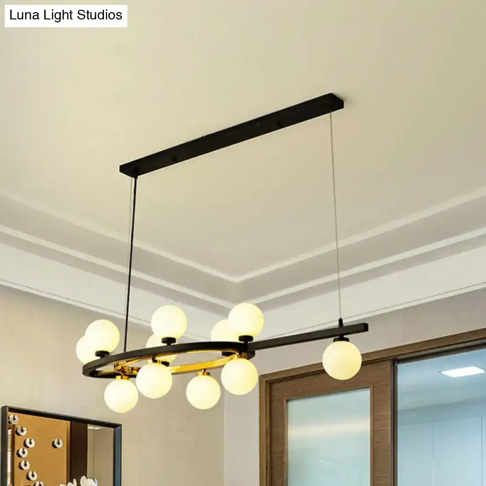 Modern black metal DecorBites Nordic bubble island pendant light with circular frame, frosted globes, and adjustable chain cord length
