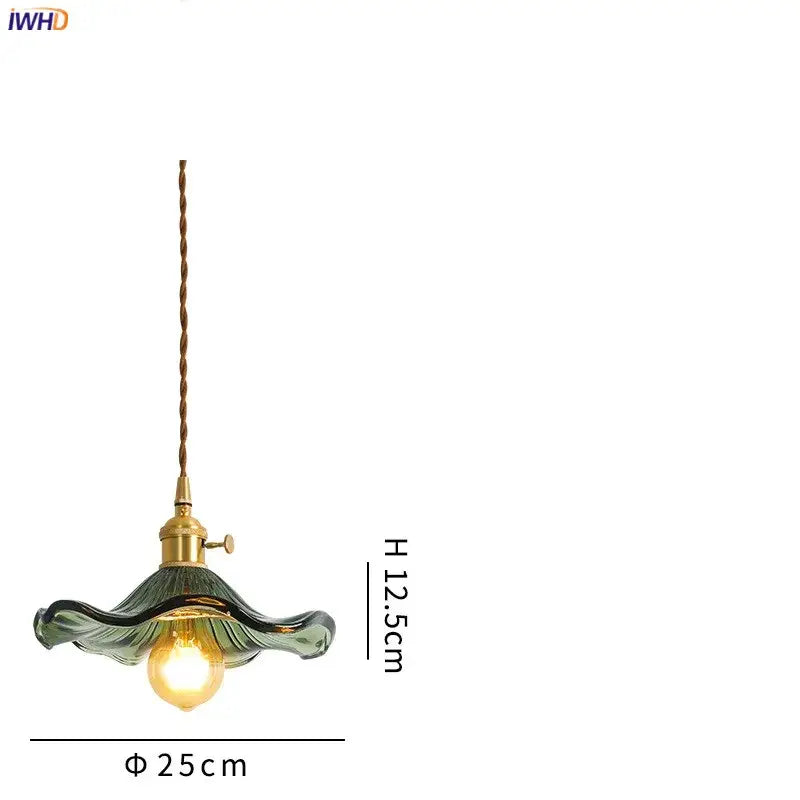 A vintage-style green wavy glass copper led pendant light with brass hardware ideal for dining room lighting