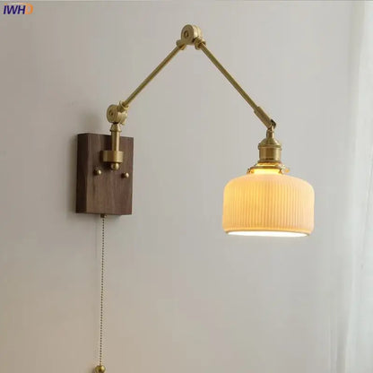 Brass-finished adjustable nordic copper wall lamp with ribbed cream glass shade and dark wood backplate for bedroom decorbites copper wall lamp