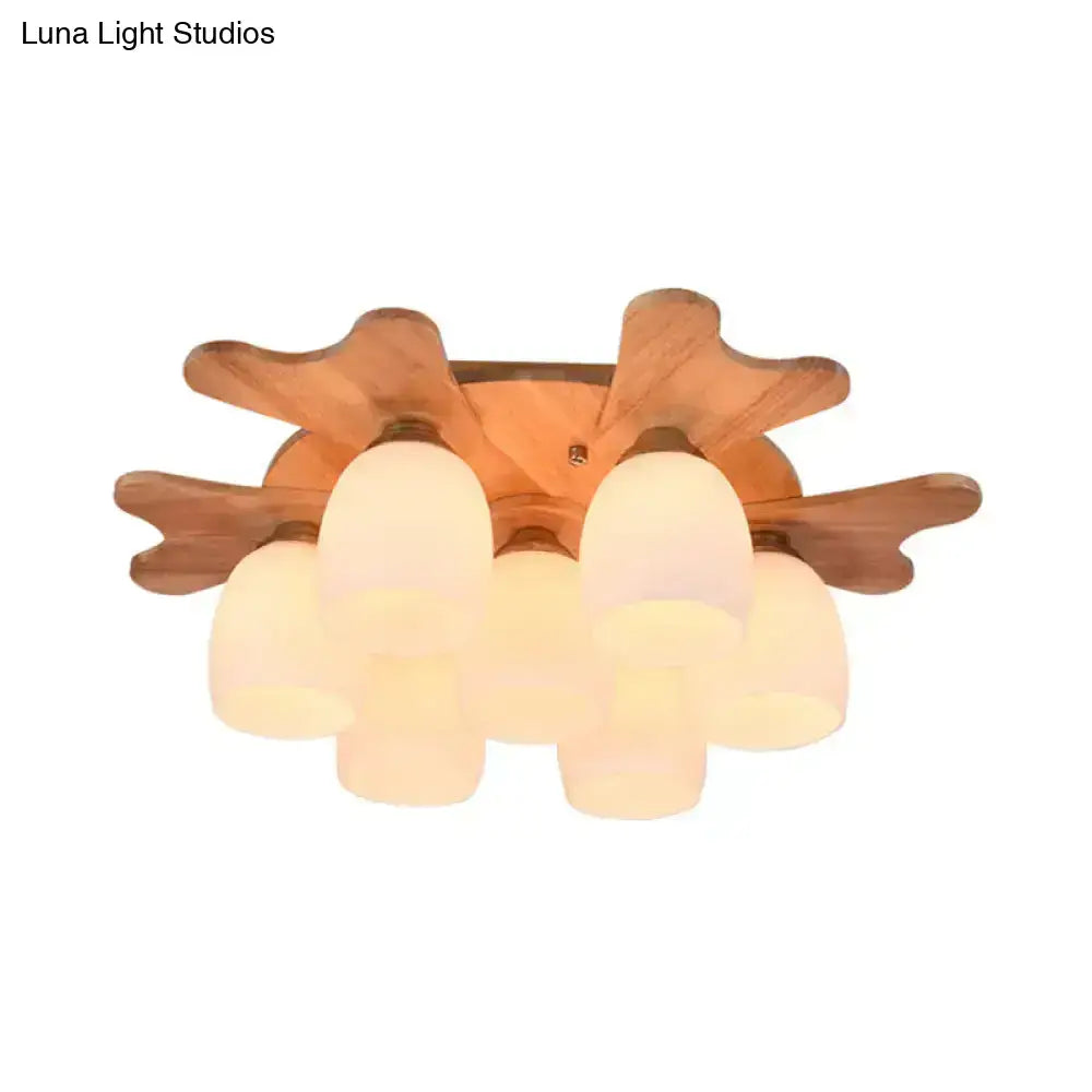 Nordic cream glass bell ceiling light with warm-toned wooden fixture and six frosted glass shades for bedroom