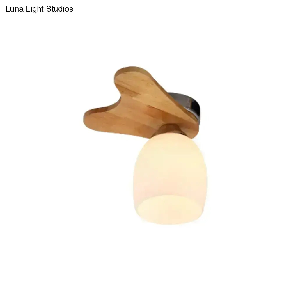 Nordic cream glass bell ceiling light with a warm wood antler fixture and frosted glass shade for bedroom use