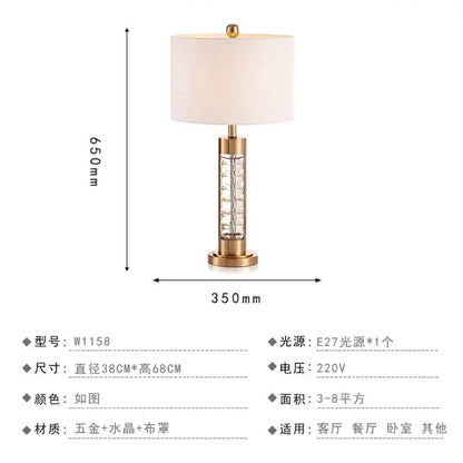 Gold-toned nordic crystal table lamp with brass accents and cream fabric shade for bedroom use