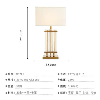 Nordic crystal table lamp with gold-toned vertical crystal rods, cream fabric shade, and polished brass base for bedroom