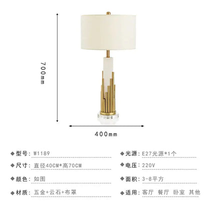 Nordic crystal table lamp with cream fabric shade, white marble column, brass accents, and clear crystal base for bedroom