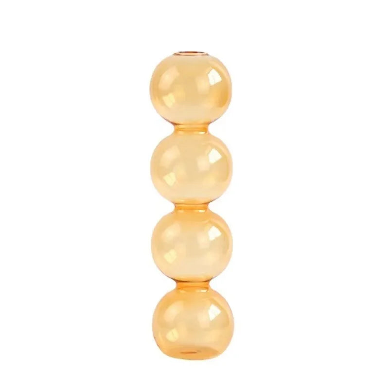 Amber-colored glass nordic bubble vase with four stacked spherical segments for hydroponic plant display and decor