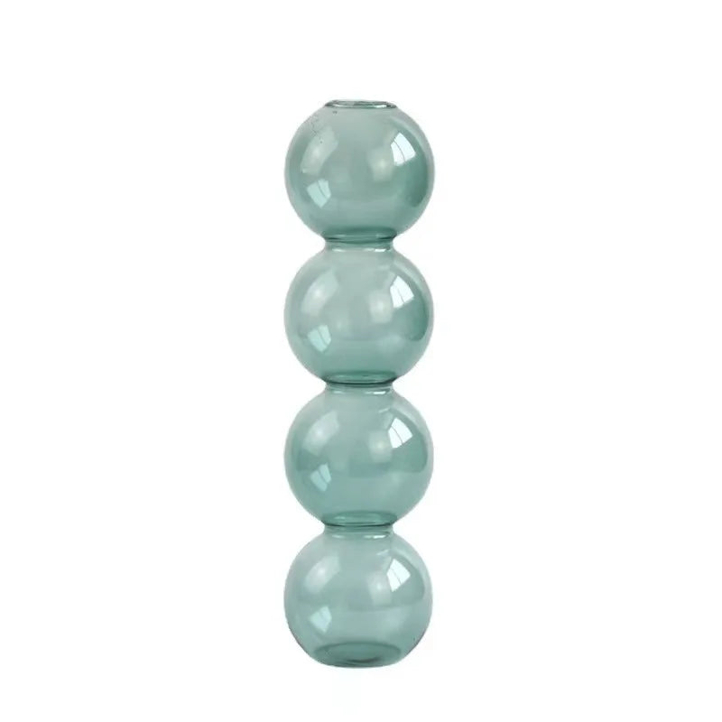 A tall translucent teal glass Nordic glass bubble vase with four stacked spheres for home desk decor