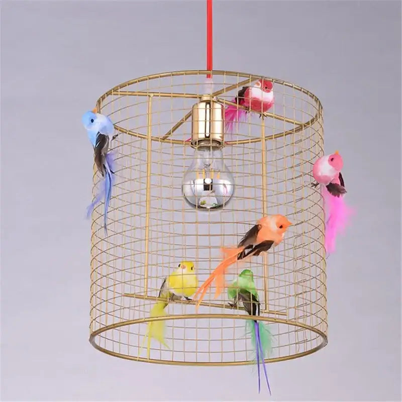 Nordic gold bird cage pendant lamp with colorful feathered birds decorative pendant lamp for bedroom decorbites bird cage
