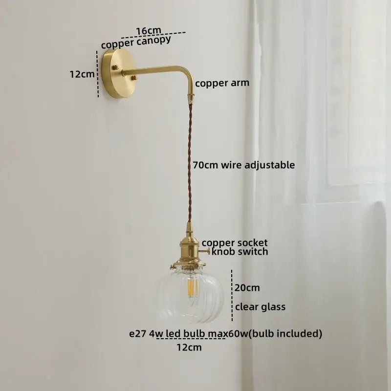 Nordic gold etched glass wall sconce lamp with brass-finished copper arm and adjustable wire for bedroom lighting