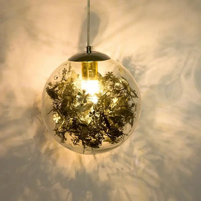 Nordic gold floral glass led pendant lamp with dried foliage inside spherical shade for kitchen lighting