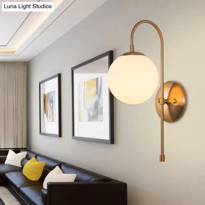 Brass-finished nordic gold wall sconce with curved arm and frosted milky glass shade for led 220v-240v 110v-120v lighting