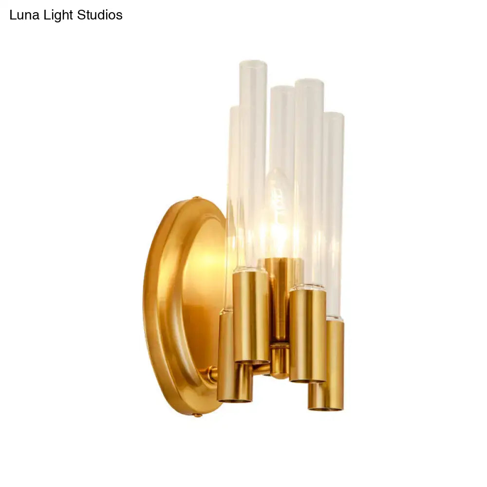 Nordic gold tube wall lamp with clear glass and brass accents for living room illumination