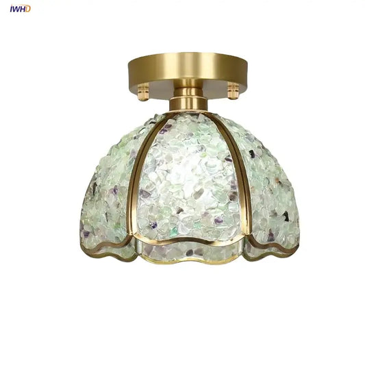 Nordic bedroom ceiling light with brass frame and dome-shaped green and purple glass crystal ceiling shade