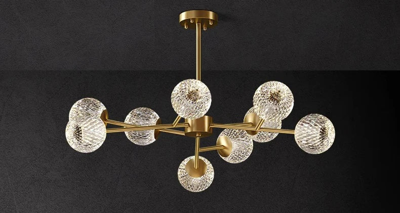 Gold-toned nordic home decor chandelier with multiple textured glass spheres for dining room indoor ceiling lighting