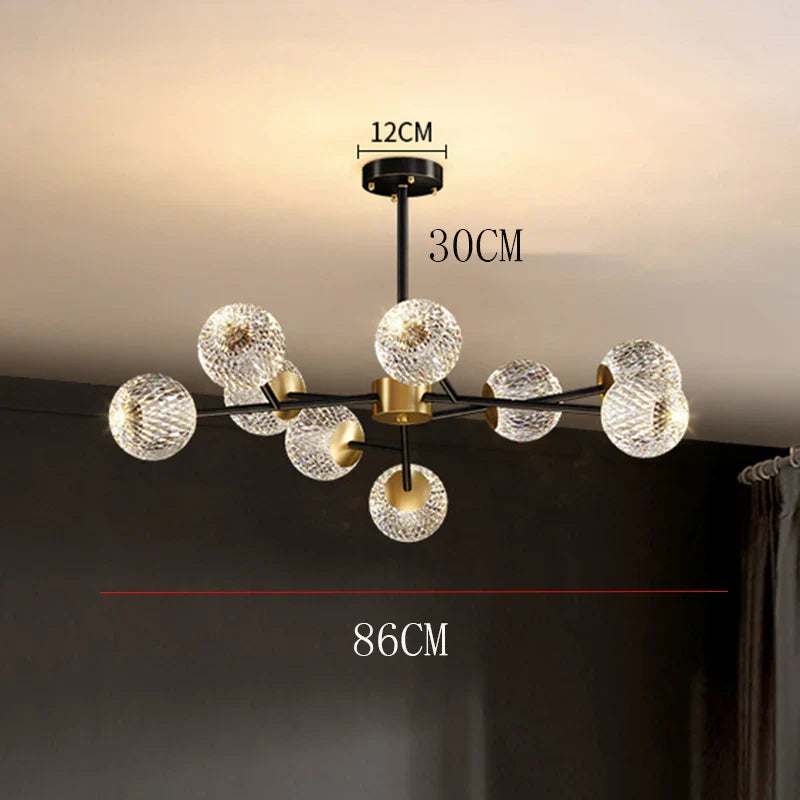 Modern black and gold metal frame chandelier with clear textured glass globe shades for nordic dining room lighting
