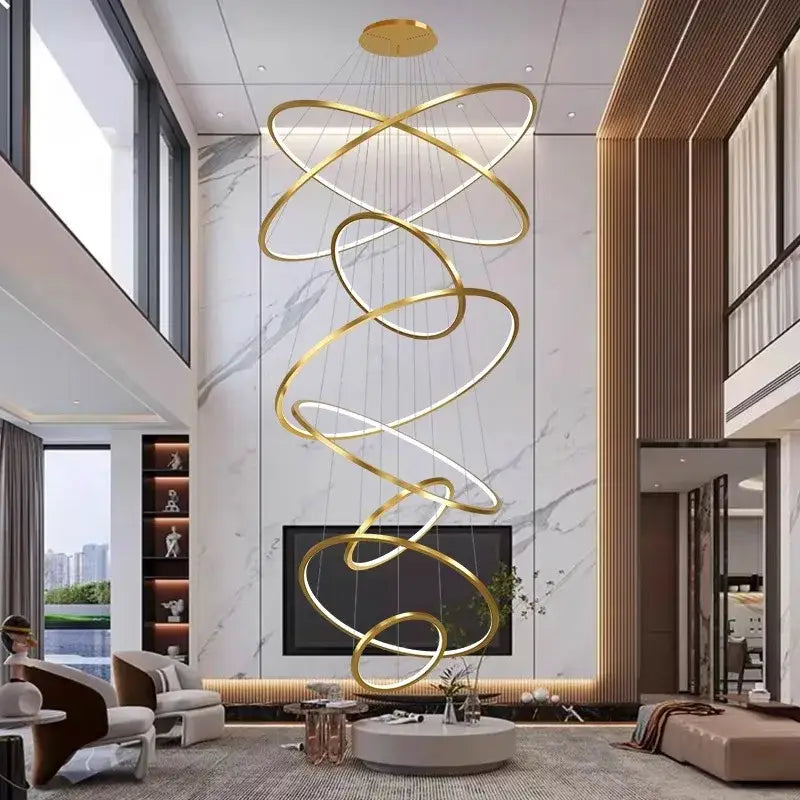 Golden spiral ring chandelier with interlocking rings in nordic home decor stair lighting by decorbites nordic home