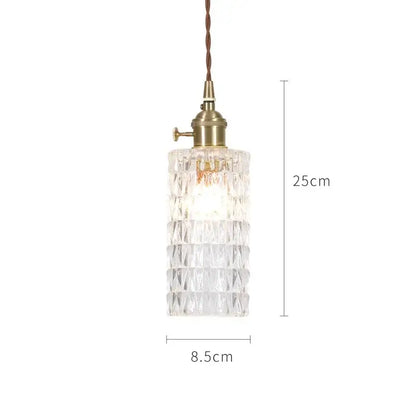 Clear faceted glass pendant lights with brass socket and brown cord in nordic japan style for dining room use