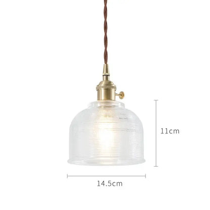 Nordic japan style glass pendant lights with clear textured glass, brass fixture, and twisted brown cord for dining room