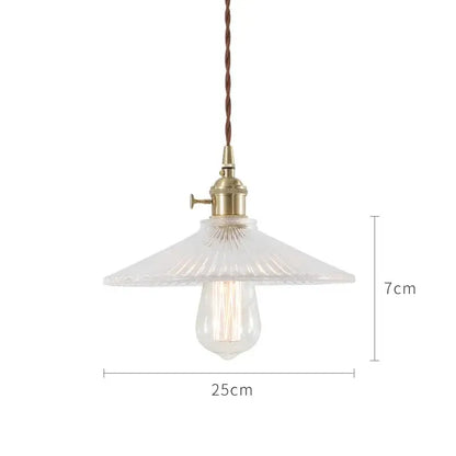Nordic japan style pendant lights with brass finish and clear textured glass shade featuring exposed edison bulb for dining room